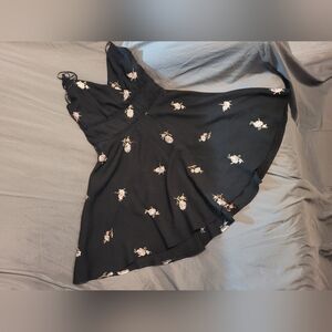 Elegant Black Dress with Floral Accents
